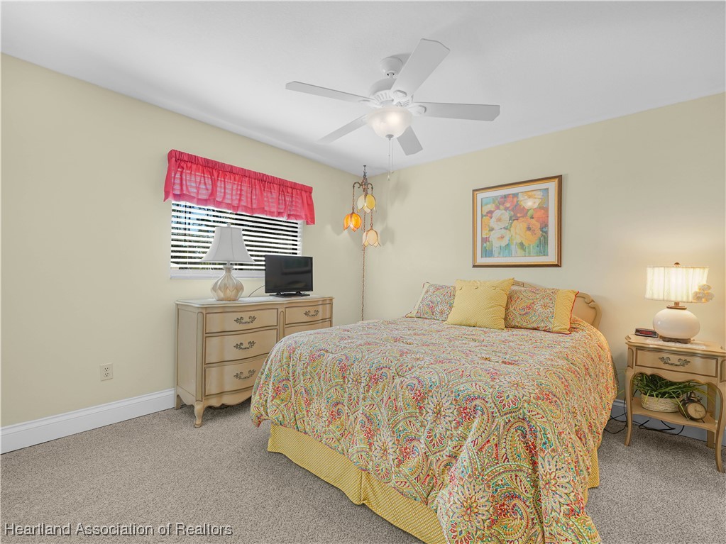 3206 Divot Road Sebring, FL 33872 - Photo 21 of 40 Rear Bedroom - brand new carpet