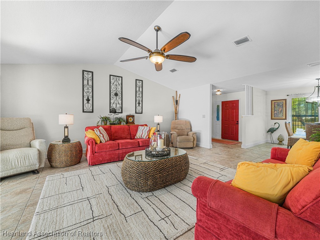 3206 Divot Road Sebring, FL 33872 - Photo 6 of 40 LR - toward foyer with view of DR