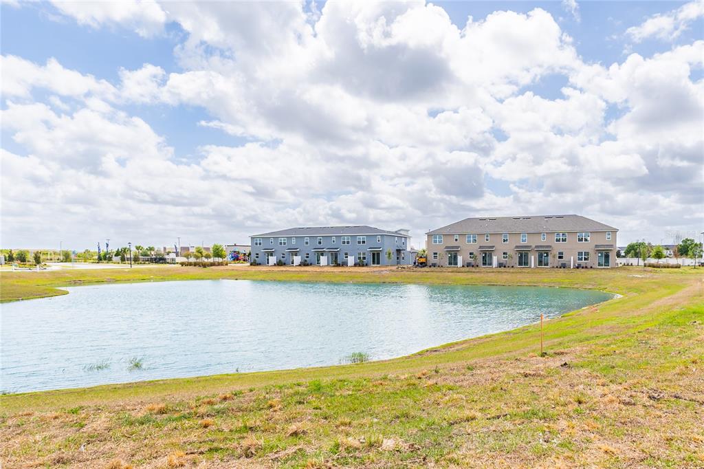 987 Spring Palms Loop Orlando, FL 32828 - Photo 22 of 23 a view of an ocean and beach