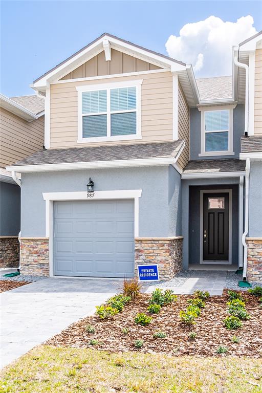 987 Spring Palms Loop Orlando, FL 32828 - Photo 23 of 23 a front view of a house