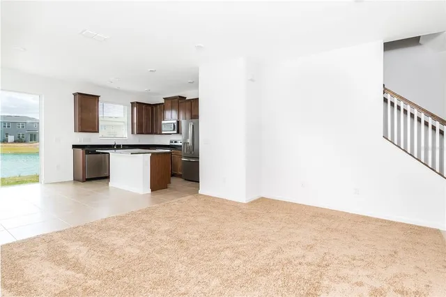 a view of kitchen with wooden floor