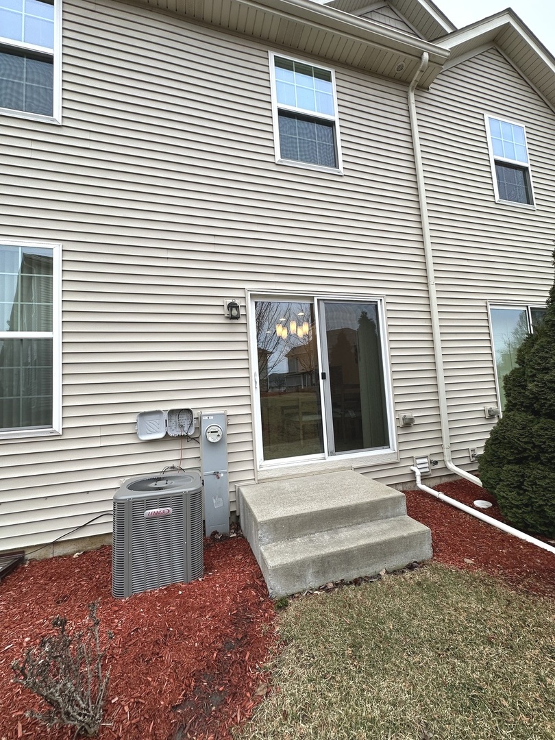 5102 Monroe Street Matteson, IL 60443 - Photo 53 of 54 a view of a small house with a white door
