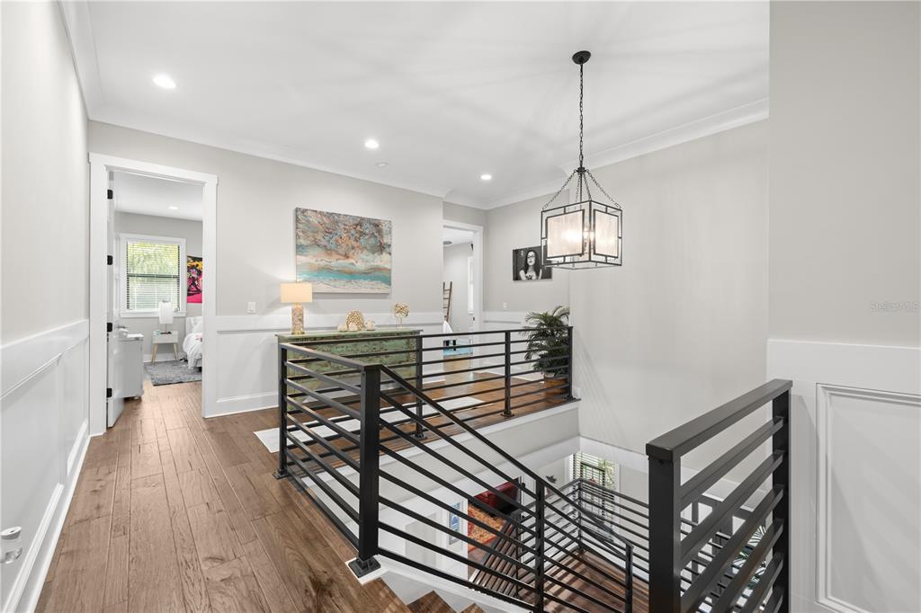 4806 West San Rafael Street Tampa, FL 33629 - Photo 16 of 60 a view of a dining room with furniture window and wooden floor