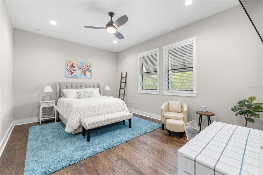 4806 West San Rafael Street Tampa, FL 33629 - Photo 29 of 60 a bedroom with a bed and a couch