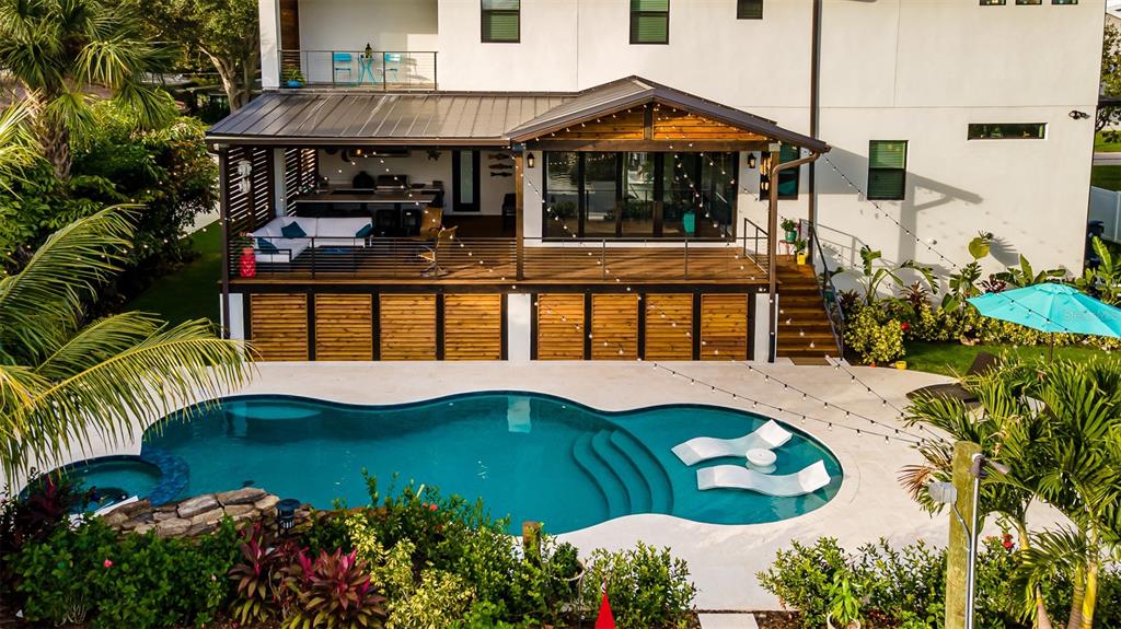 4806 West San Rafael Street Tampa, FL 33629 - Photo 42 of 60 a front view of house with yard and seating area