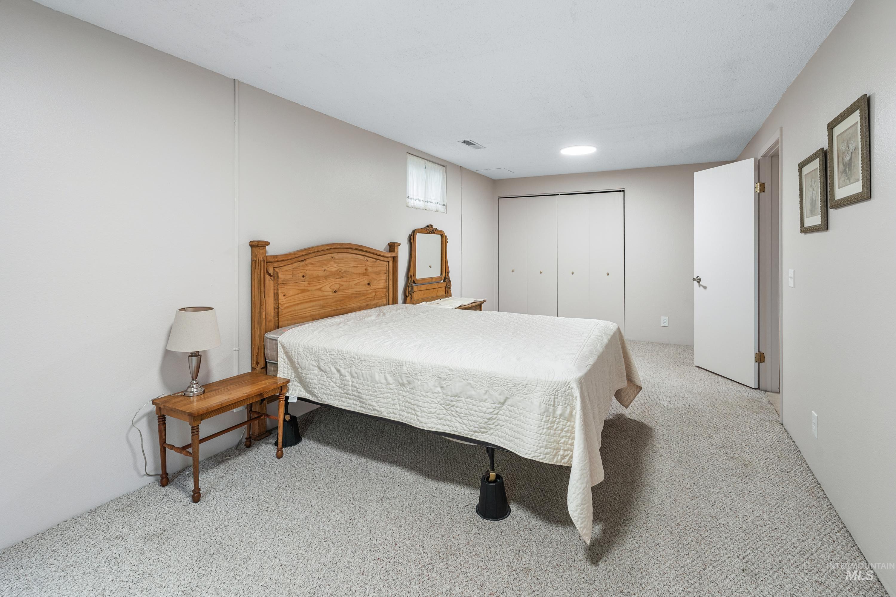 2963 Mayfair Ridge Lewiston, ID 83501 - Photo 33 of 45 Recessed ceiling lighting, wall-to-wall carpeting, and a white interior door with a lever handle