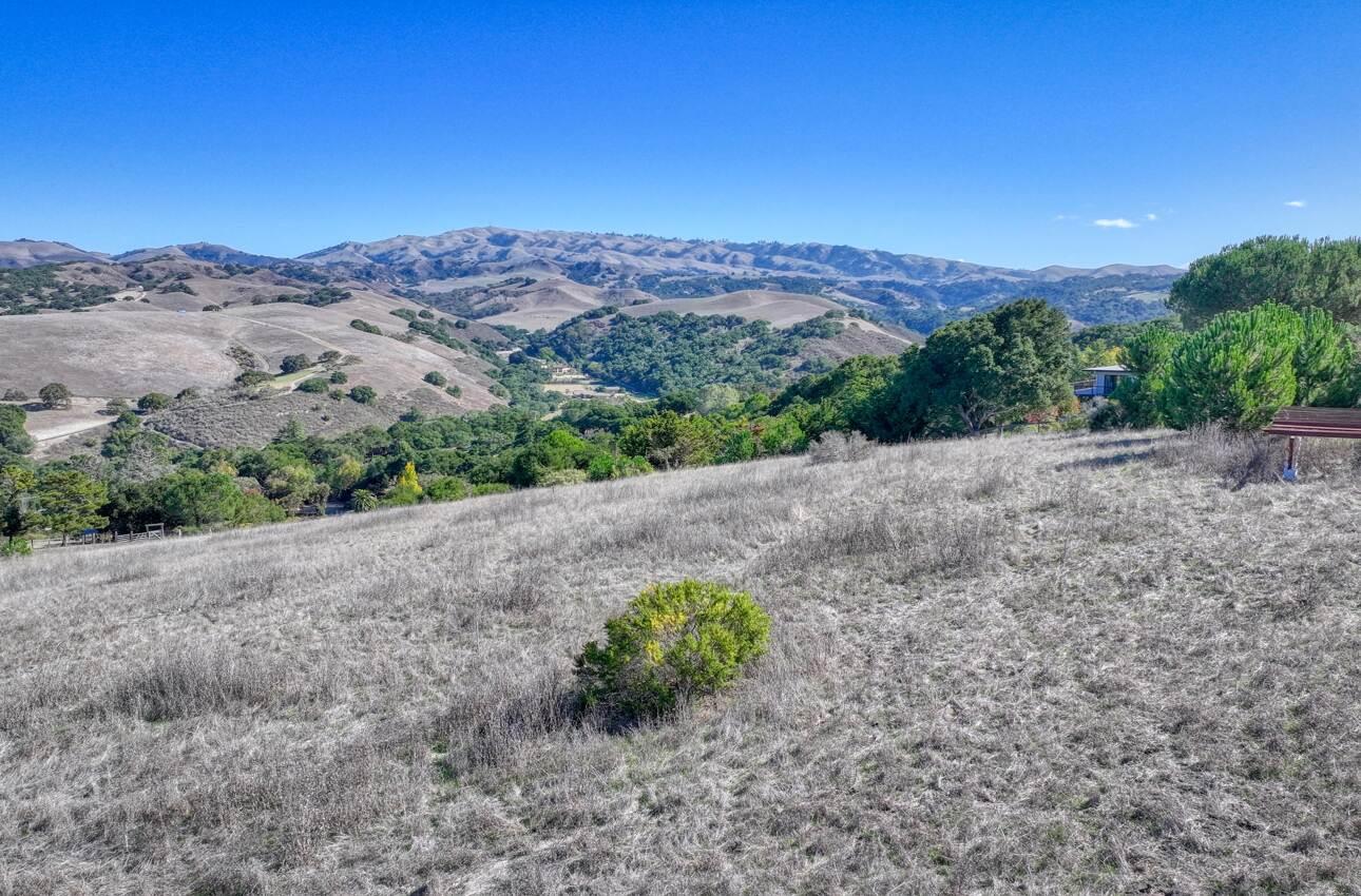 297 Corral De Tierra Road Salinas, CA 93908 - Photo 14 of 28 a view of a dry field with mountains in the background