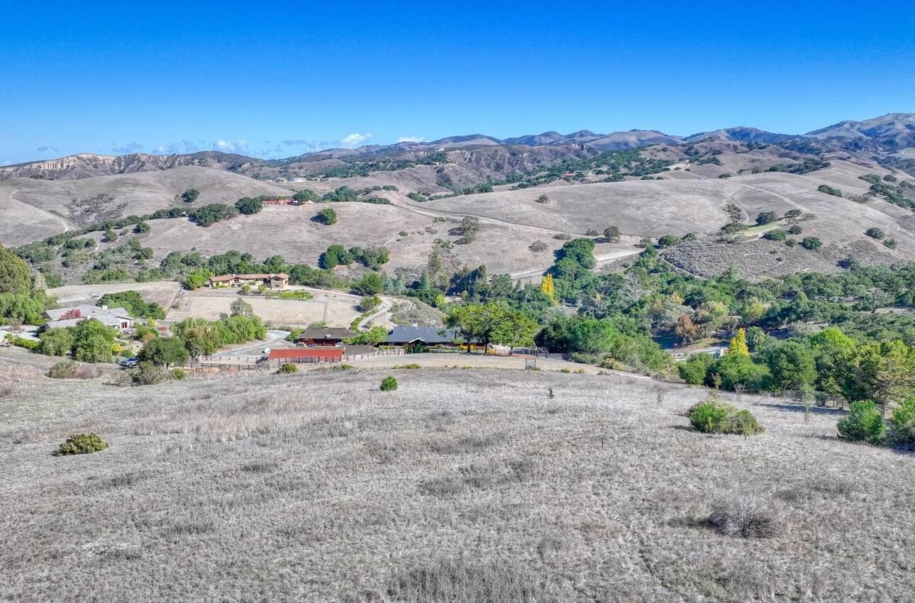 297 Corral De Tierra Road Salinas, CA 93908 - Photo 20 of 28 a view of a road with a mountain in the background