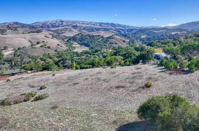 an aerial view of mountain with outdoor space