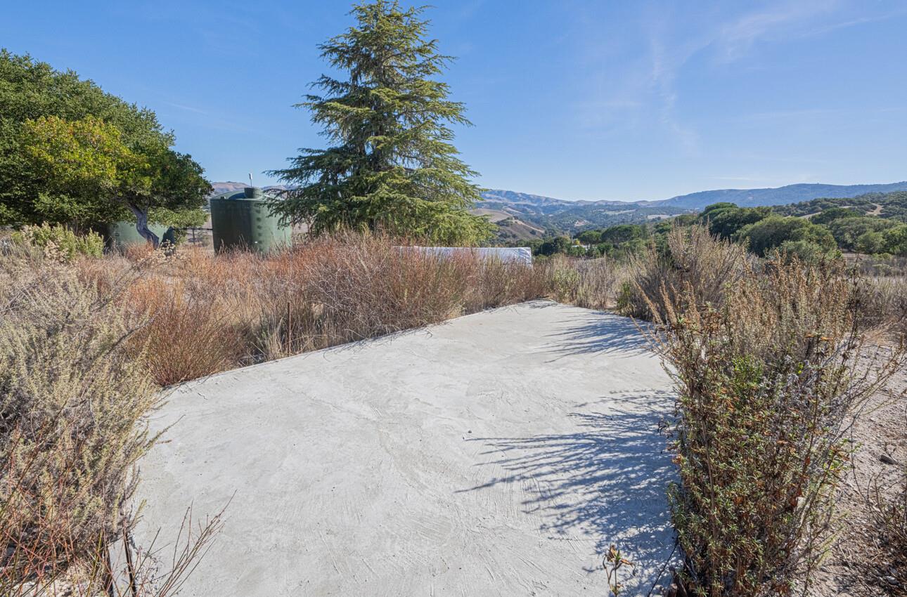 297 Corral De Tierra Road Salinas, CA 93908 - Photo 23 of 28 a view of a dry yard with wooden fence