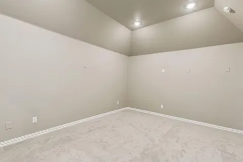 en view interior of a house with a ceiling fan and windows