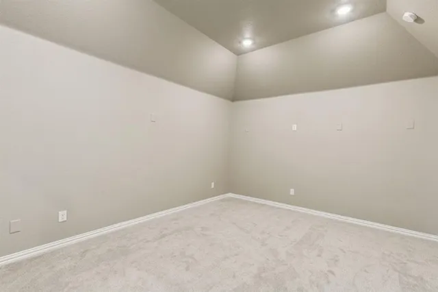 en view interior of a house with a ceiling fan and windows