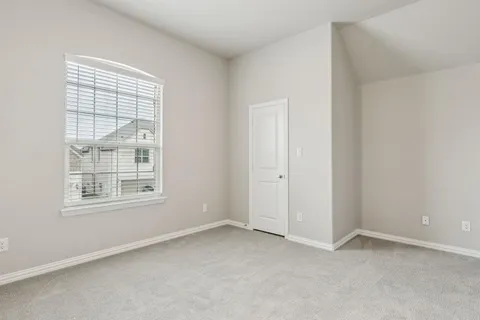 a bathroom with a granite countertop sink toilet a shower and a mirror