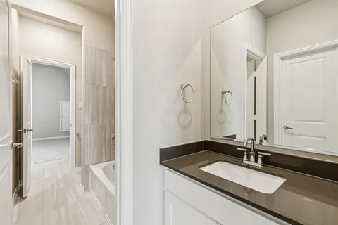 a view of an empty room and fire place