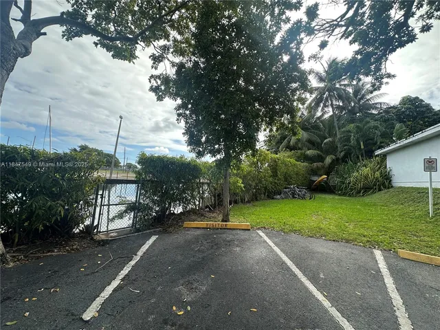 a view of a street with houses on both side