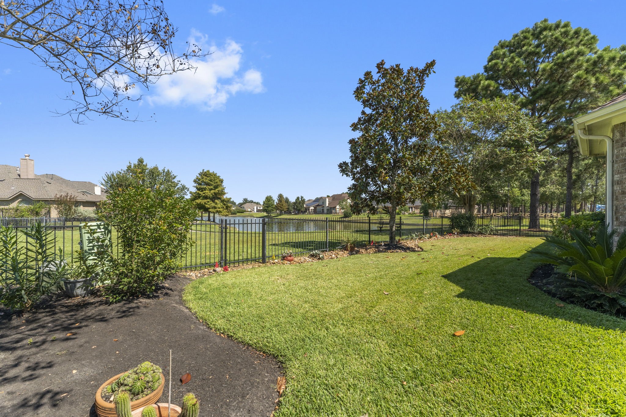 3131 Rustic Gardens Drive Spring, TX 77386 - Photo 12 of 39 a view of a playground with a swimming pool