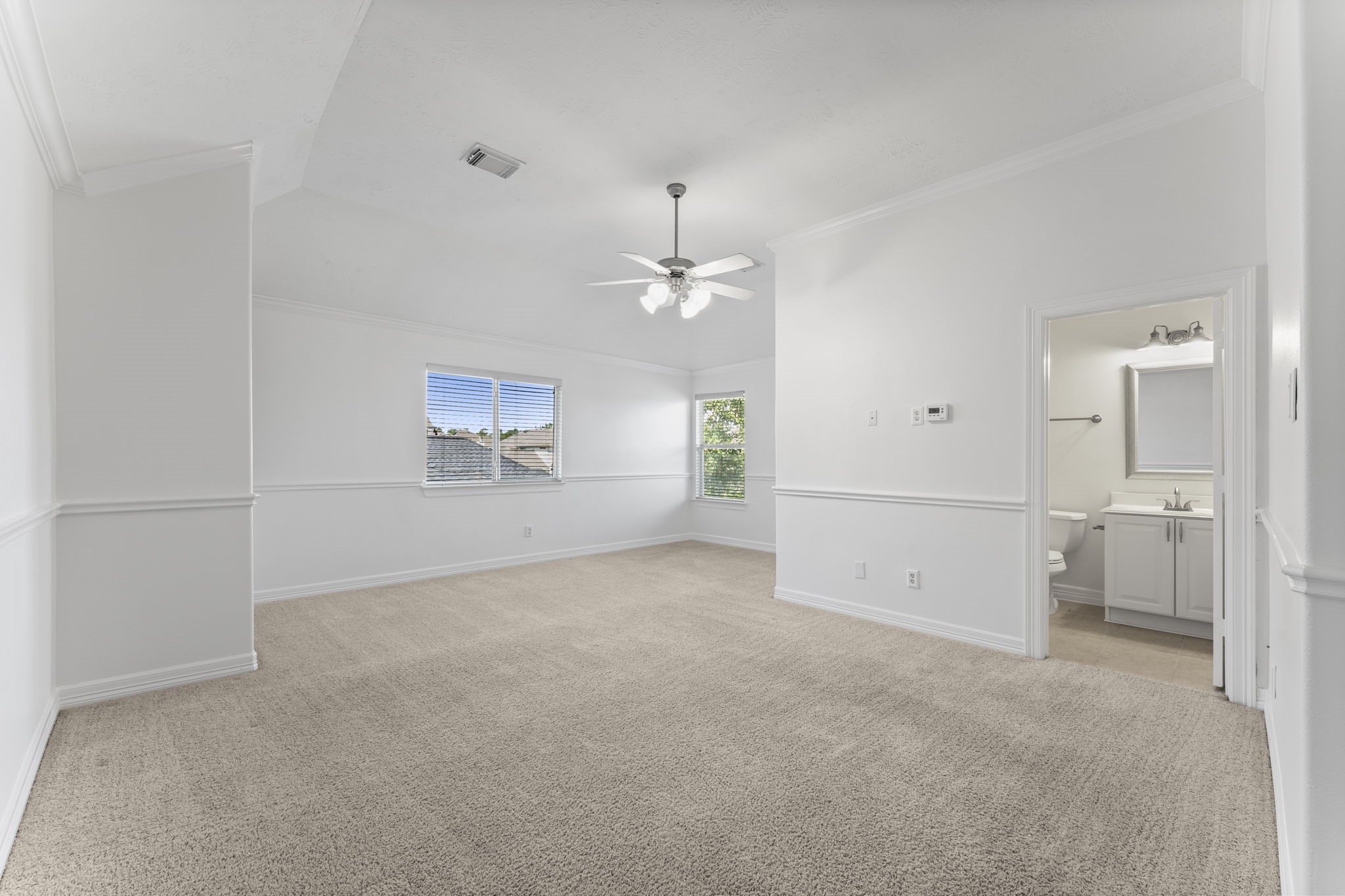 3131 Rustic Gardens Drive Spring, TX 77386 - Photo 19 of 39 a view of a room with an empty space and a window
