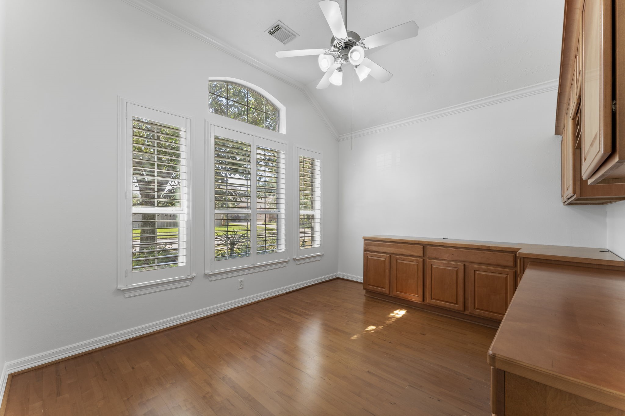 3131 Rustic Gardens Drive Spring, TX 77386 - Photo 21 of 39 a view of an empty room with a window and wooden floor