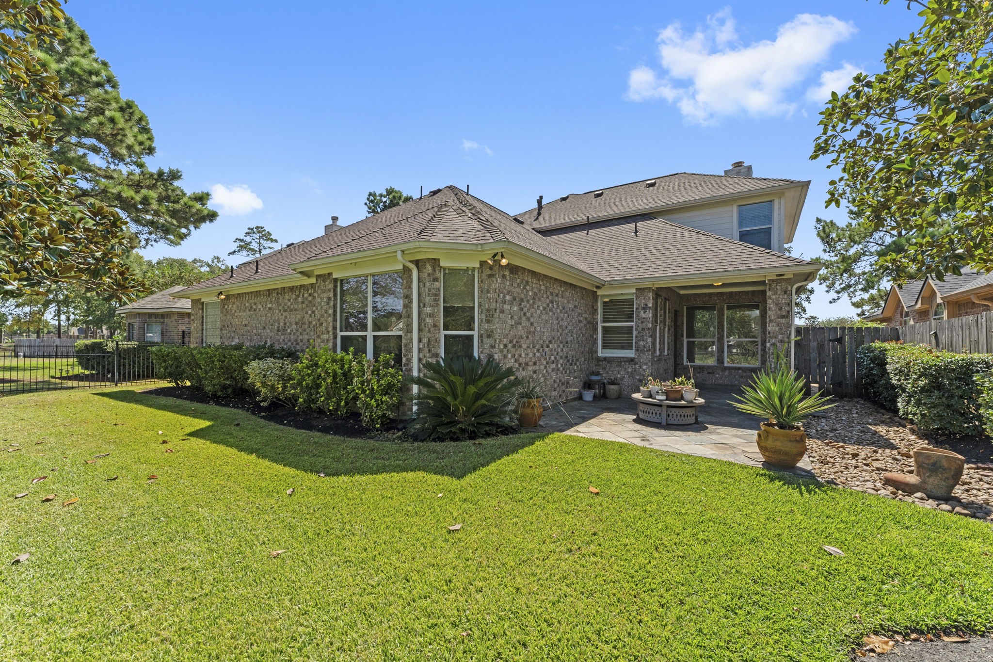 3131 Rustic Gardens Drive Spring, TX 77386 - Photo 31 of 39 a front view of a house with garden