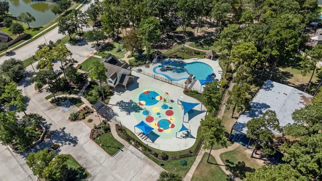 a house view with a sitting space and garden