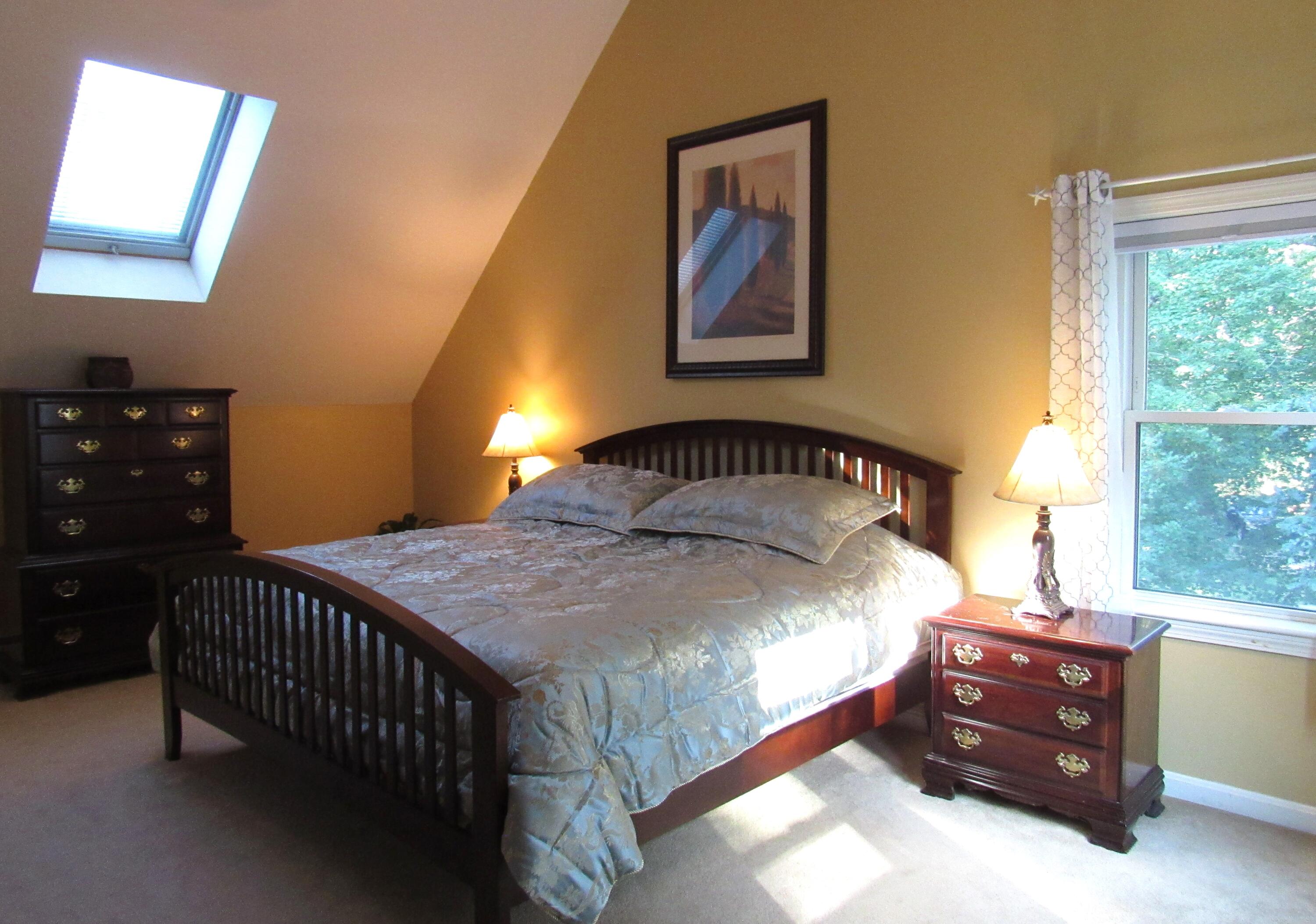 249 Ames Way Centerville, MA 02632 - Photo 22 of 41 a bedroom with a bed and a window