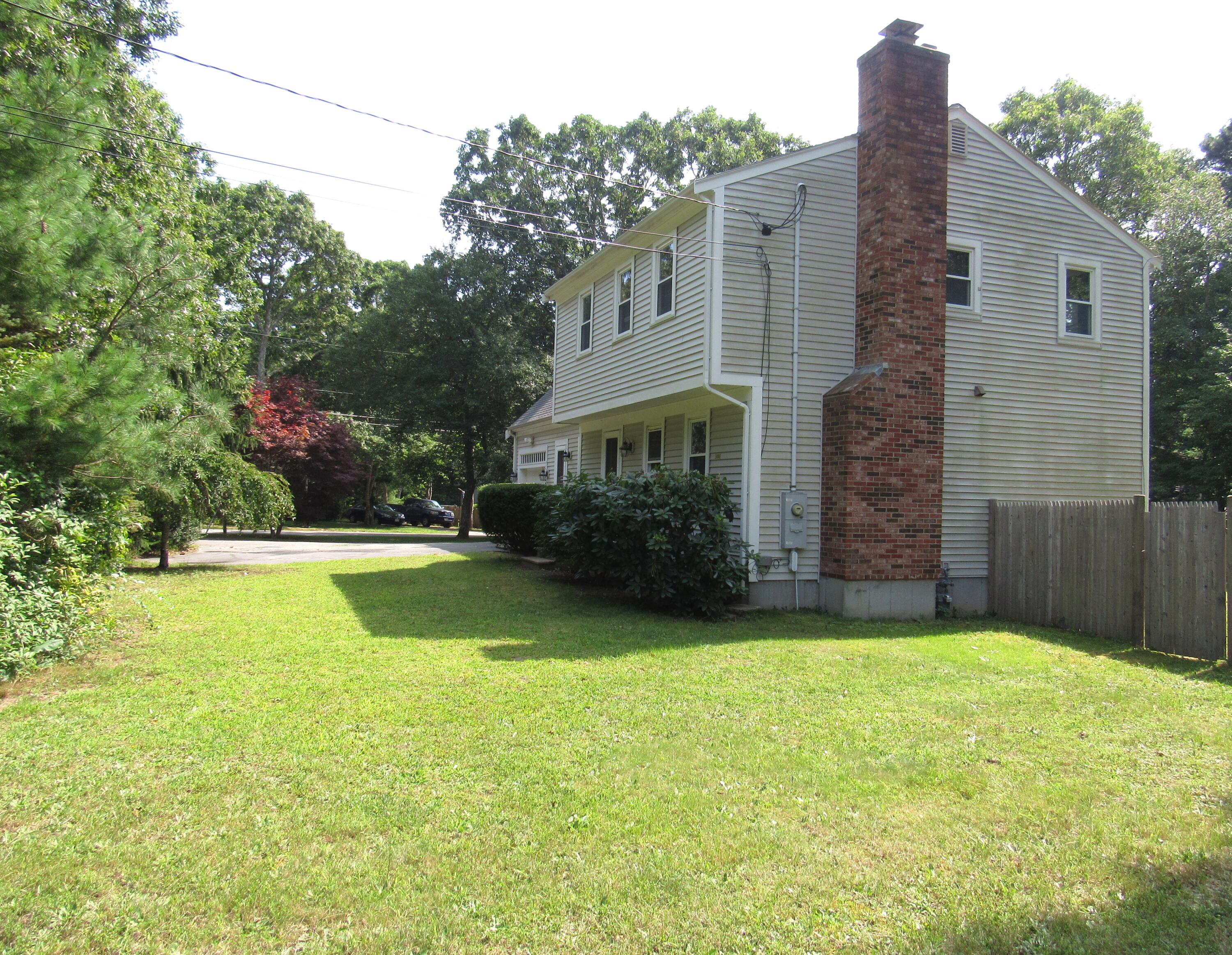 249 Ames Way Centerville, MA 02632 - Photo 3 of 41 a view of a house with a swimming pool
