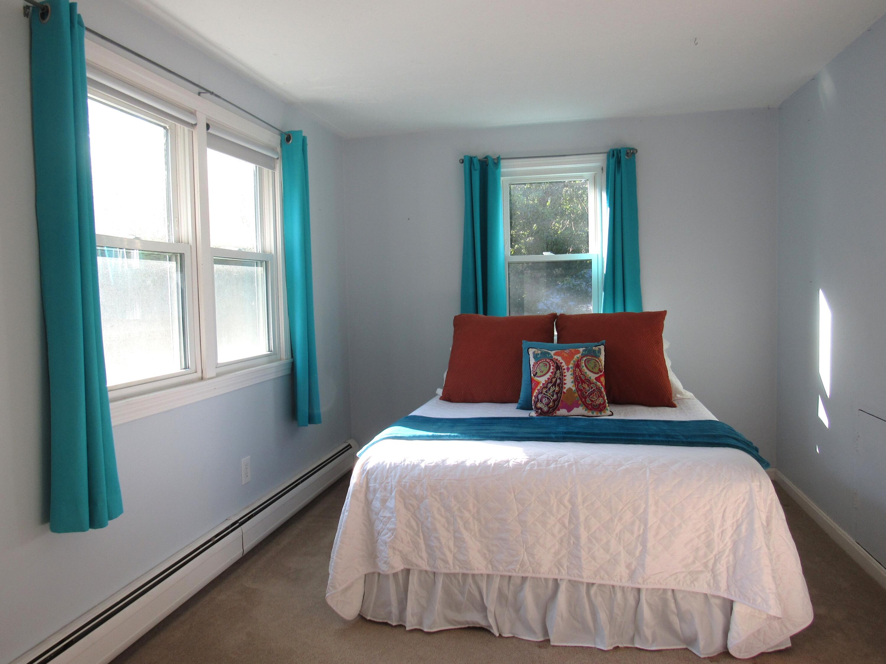 249 Ames Way Centerville, MA 02632 - Photo 32 of 41 a bedroom with a bed and window