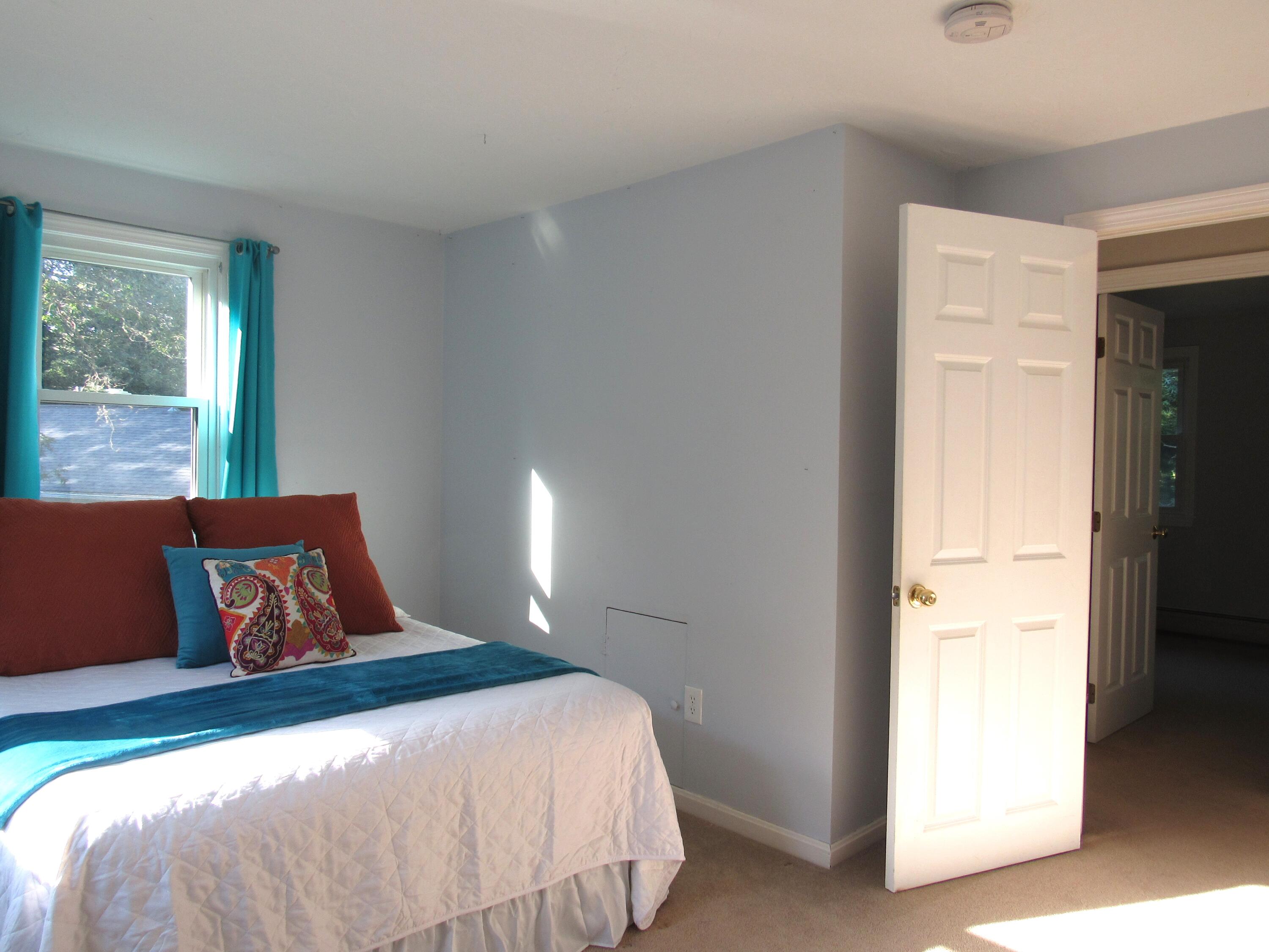 249 Ames Way Centerville, MA 02632 - Photo 33 of 41 a bedroom with a bed and a window