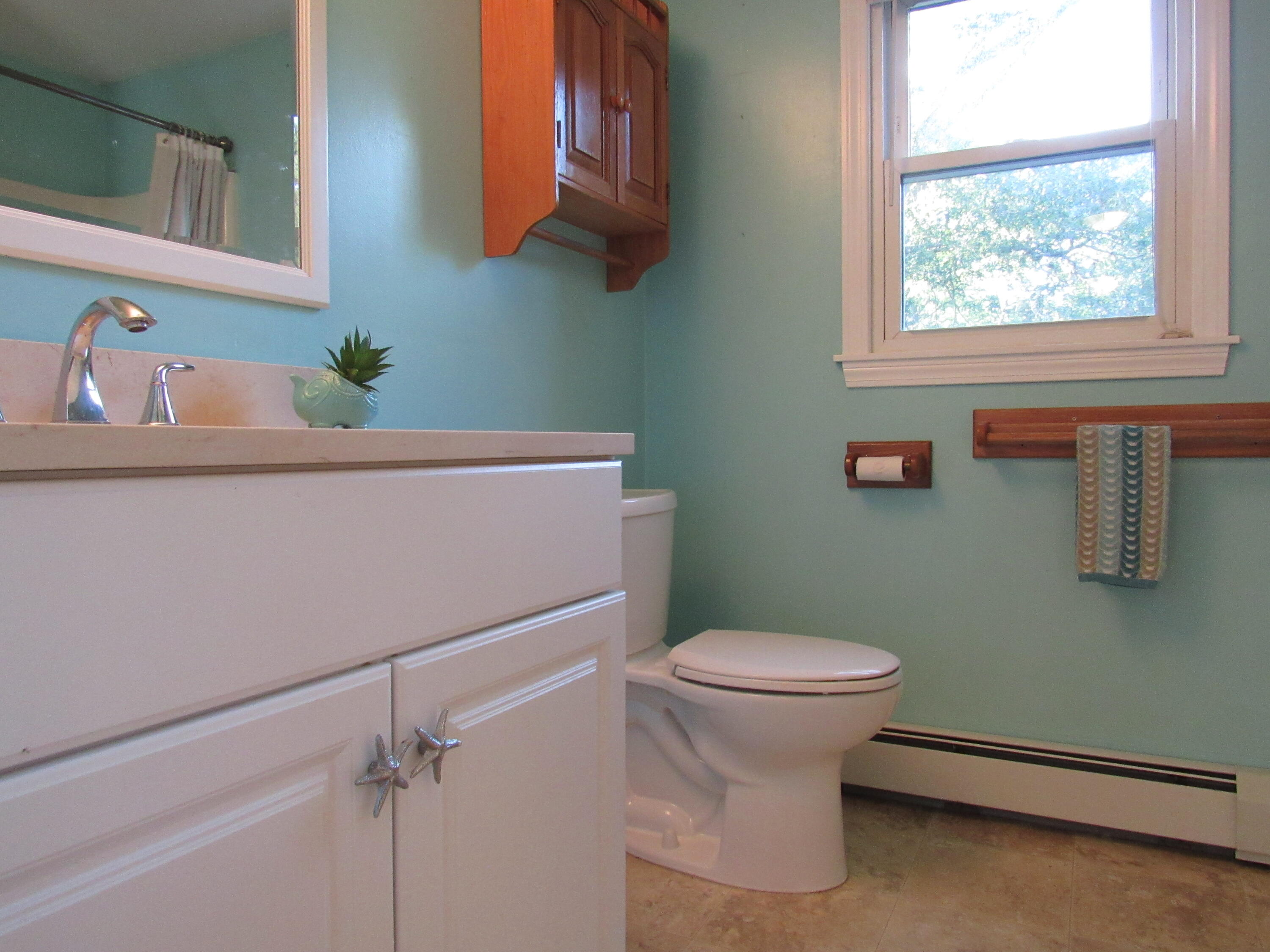 249 Ames Way Centerville, MA 02632 - Photo 36 of 41 a bathroom with a toilet and a sink