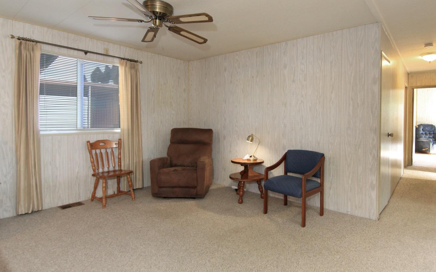 4425 Clares Street, Unit 3 Capitola, CA 95010 - Photo 12 of 23 a living room with furniture and a window