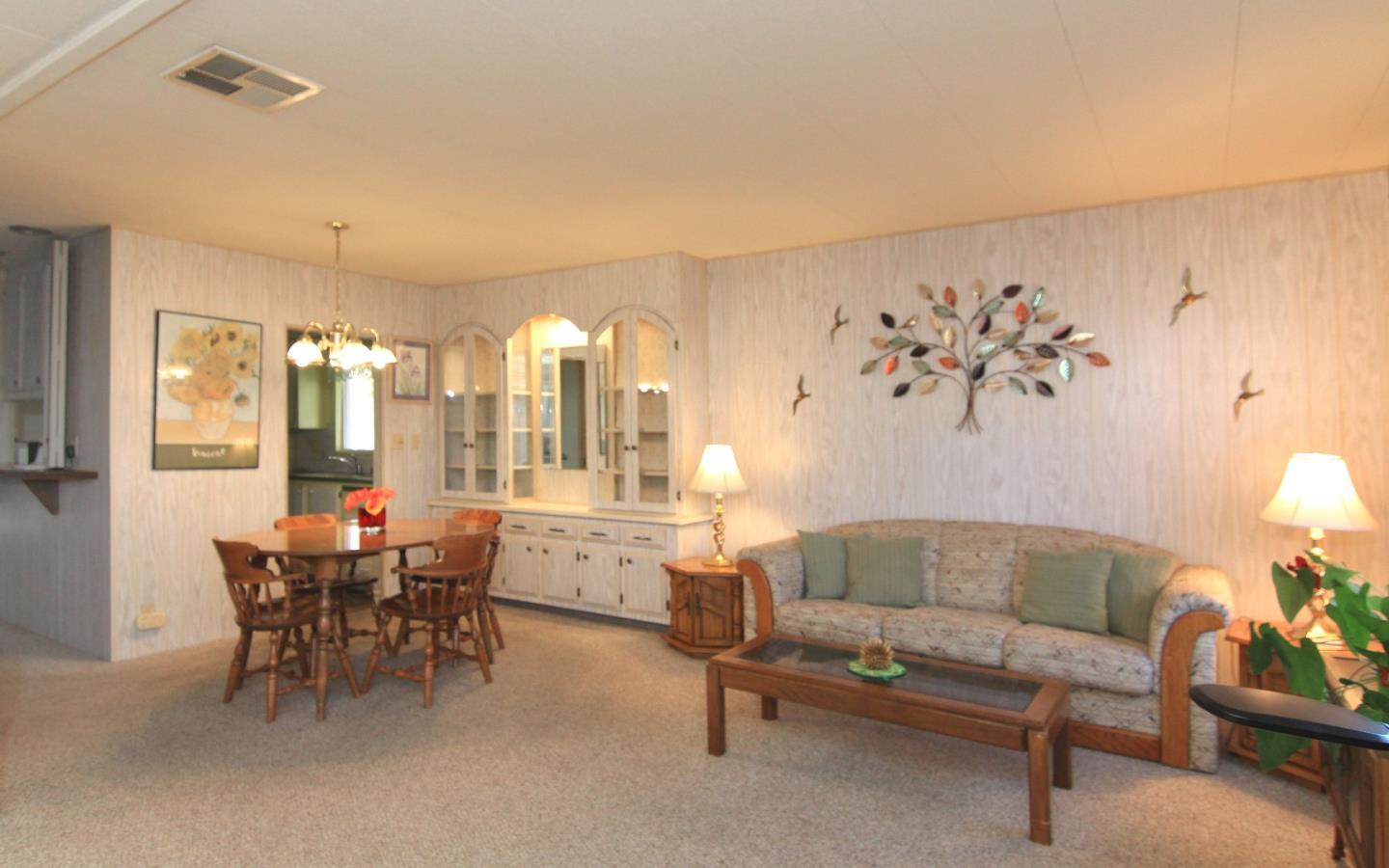 4425 Clares Street, Unit 3 Capitola, CA 95010 - Photo 7 of 23 a living room with furniture and window