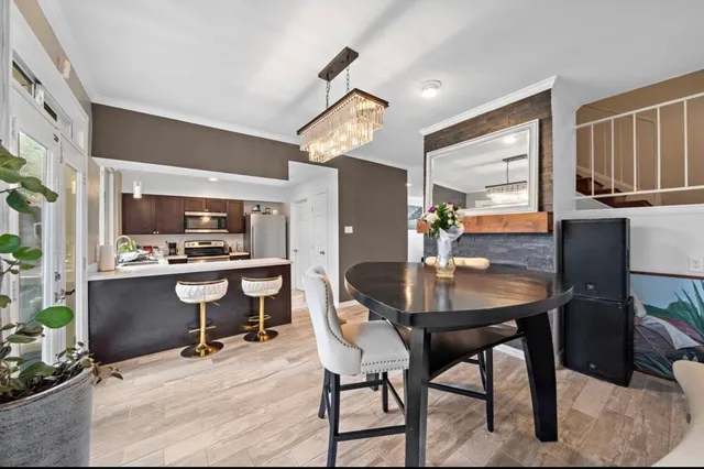 a view of a dining room with furniture