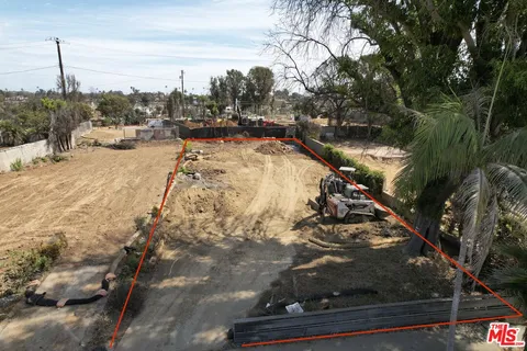 a view of a yard with a slide