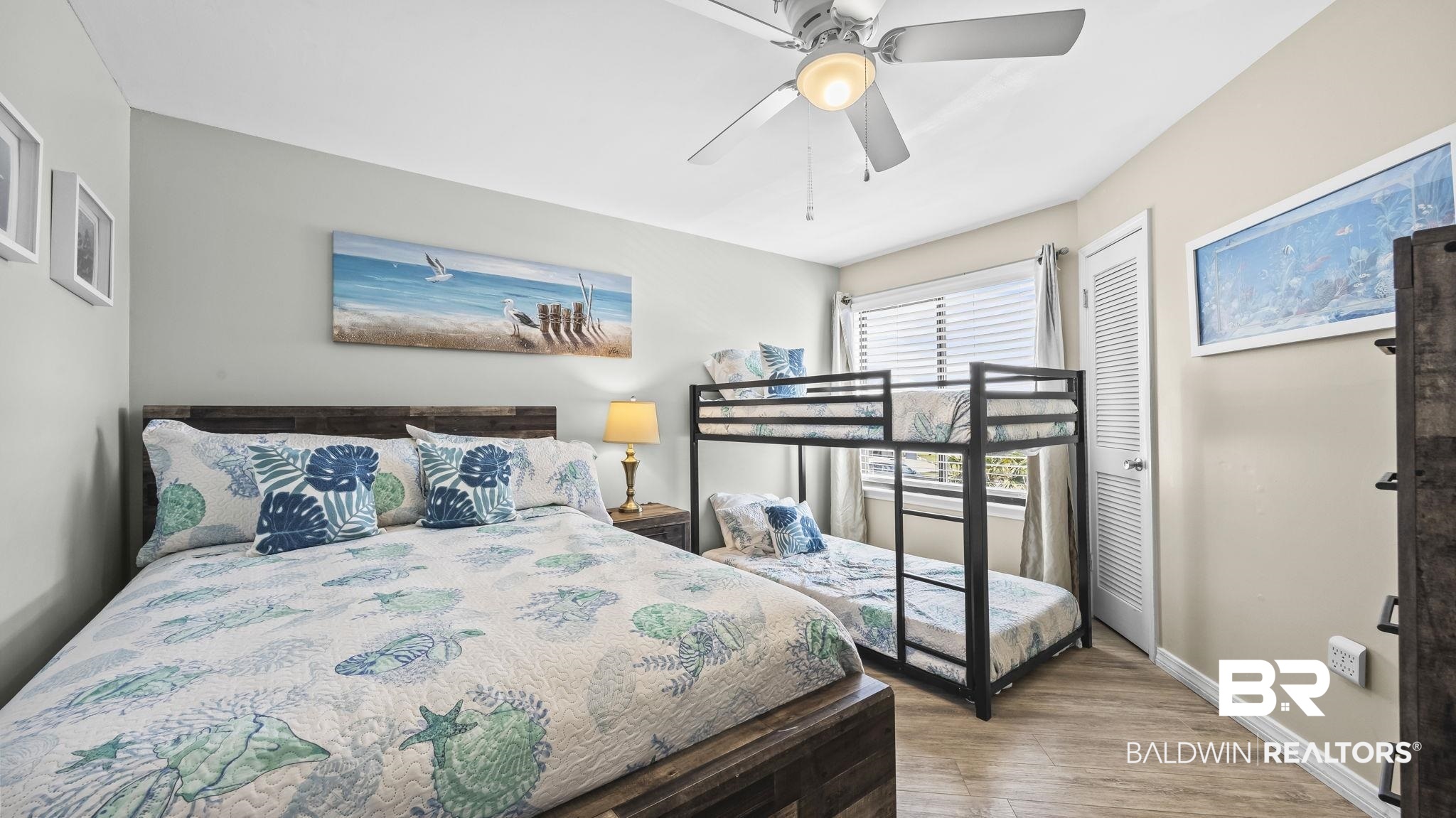 497 Plantation Road, Unit 1247 Gulf Shores, AL 36542 - Photo 13 of 29 Bedroom featuring wood finished floors and ceiling fan
