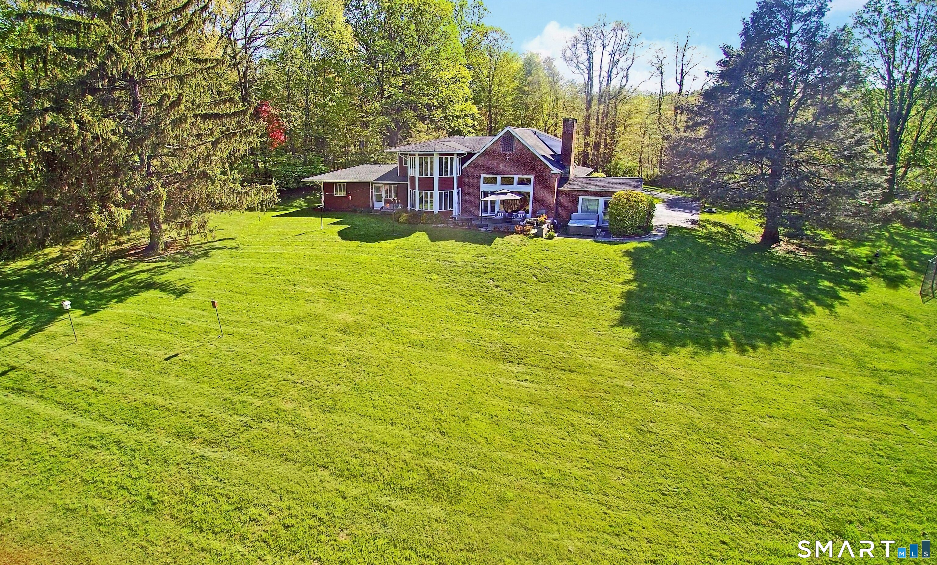 68 Bloomer Road Ridgefield, CT 06877 - Photo 40 of 40 a view of a house with a big yard