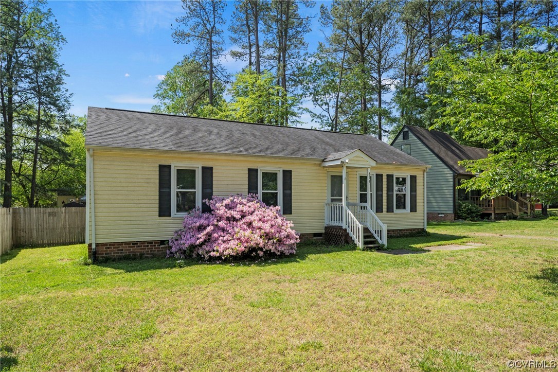 3207 Roland View Terrace Chester, VA 23831 - Photo 1 of 20 a front view of a house with garden
