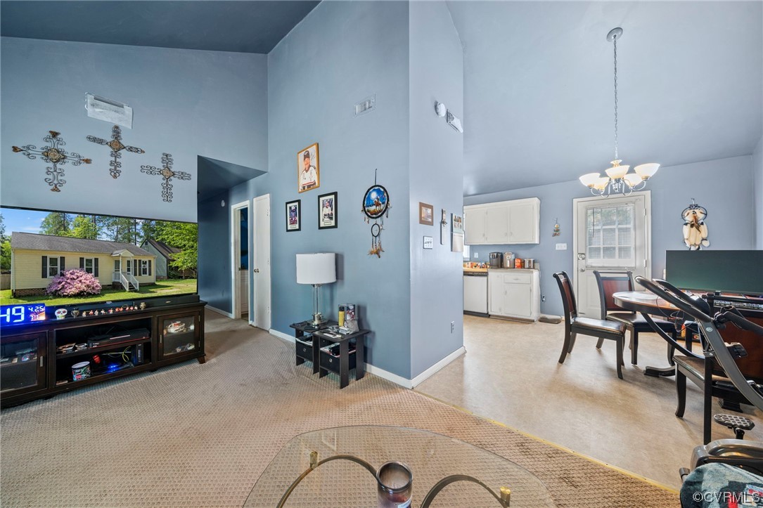 3207 Roland View Terrace Chester, VA 23831 - Photo 16 of 20 a living room with furniture and a flat screen tv