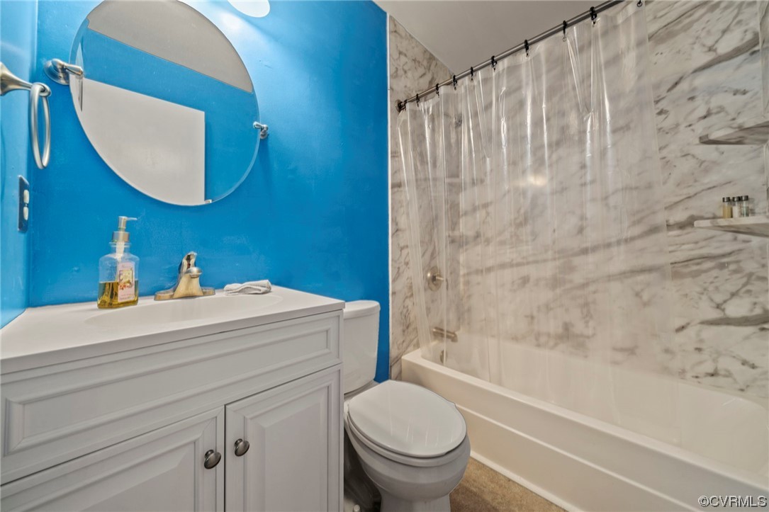 3207 Roland View Terrace Chester, VA 23831 - Photo 3 of 20 a bathroom with a sink a toilet and a bathtub