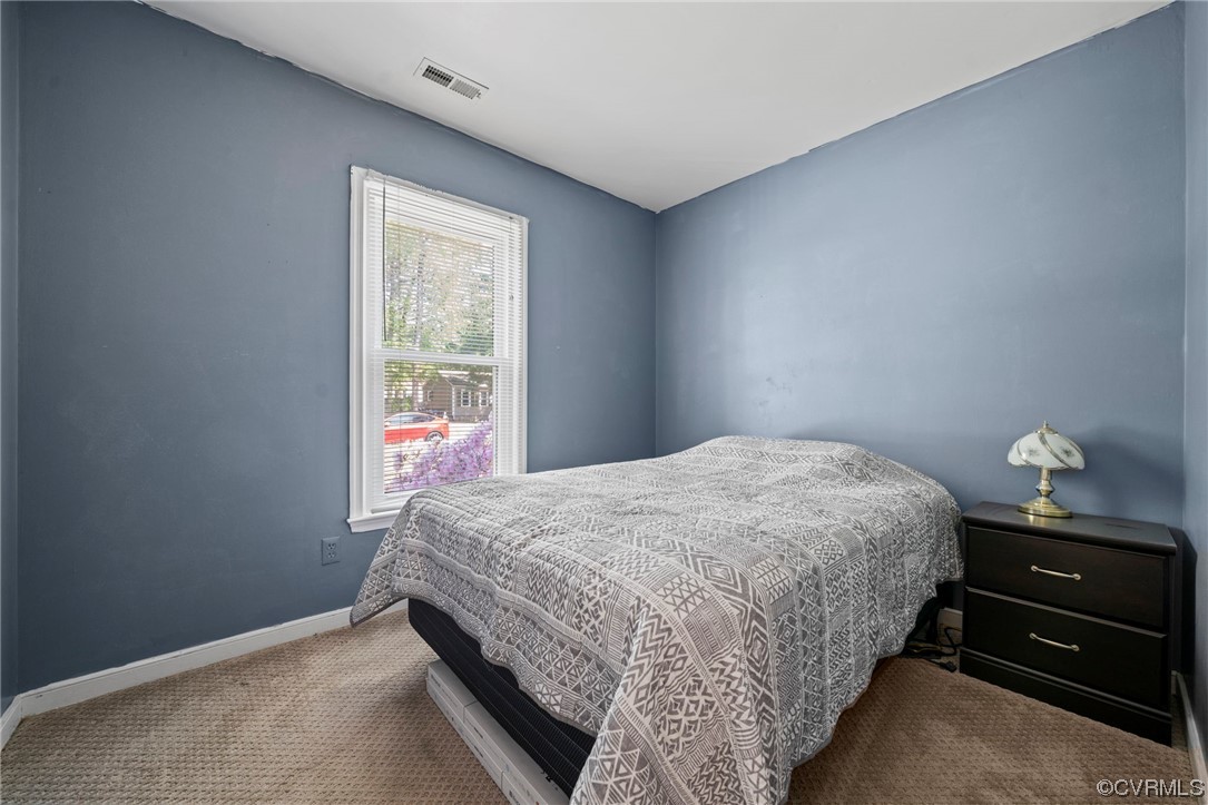 3207 Roland View Terrace Chester, VA 23831 - Photo 4 of 20 a bedroom with a bed and a window