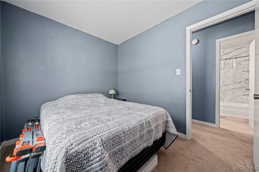 3207 Roland View Terrace Chester, VA 23831 - Photo 5 of 20 a bedroom with a bed and wooden floor
