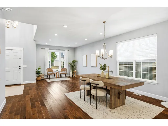 a dining room with furniture window wooden floor