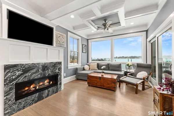 a kitchen with stainless steel appliances a sink stove and refrigerator