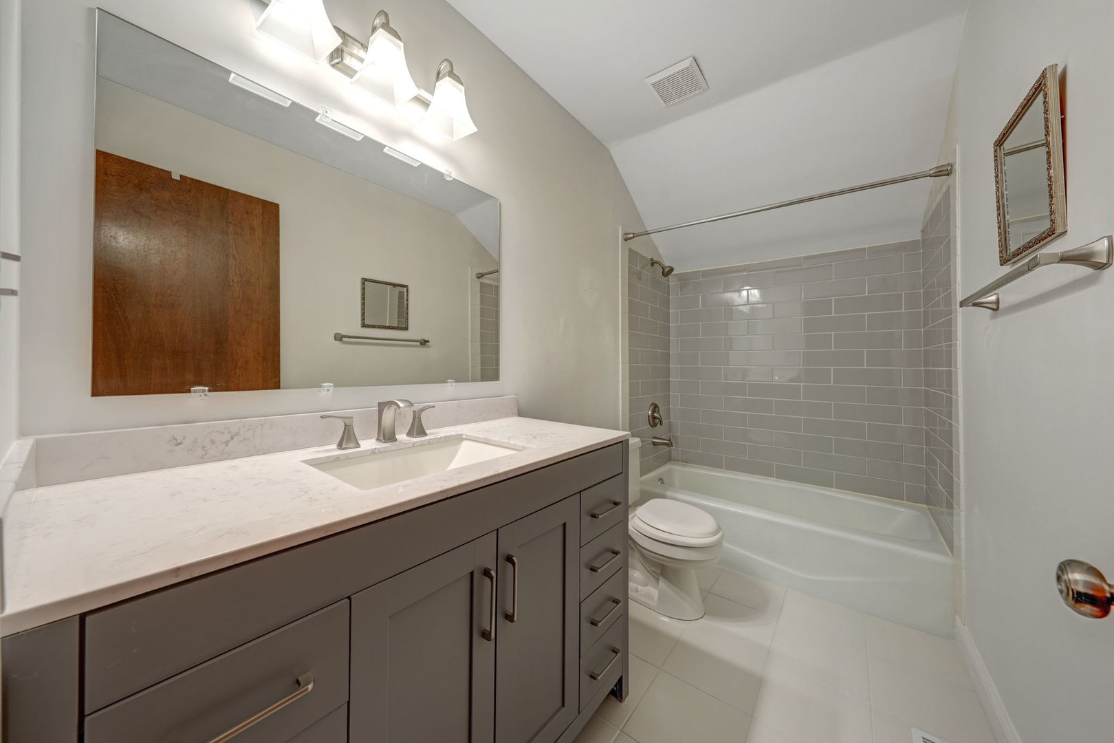 4977 Prairie Oak Road Gurnee, IL 60031 - Photo 15 of 26 a bathroom with a sink a toilet and shower