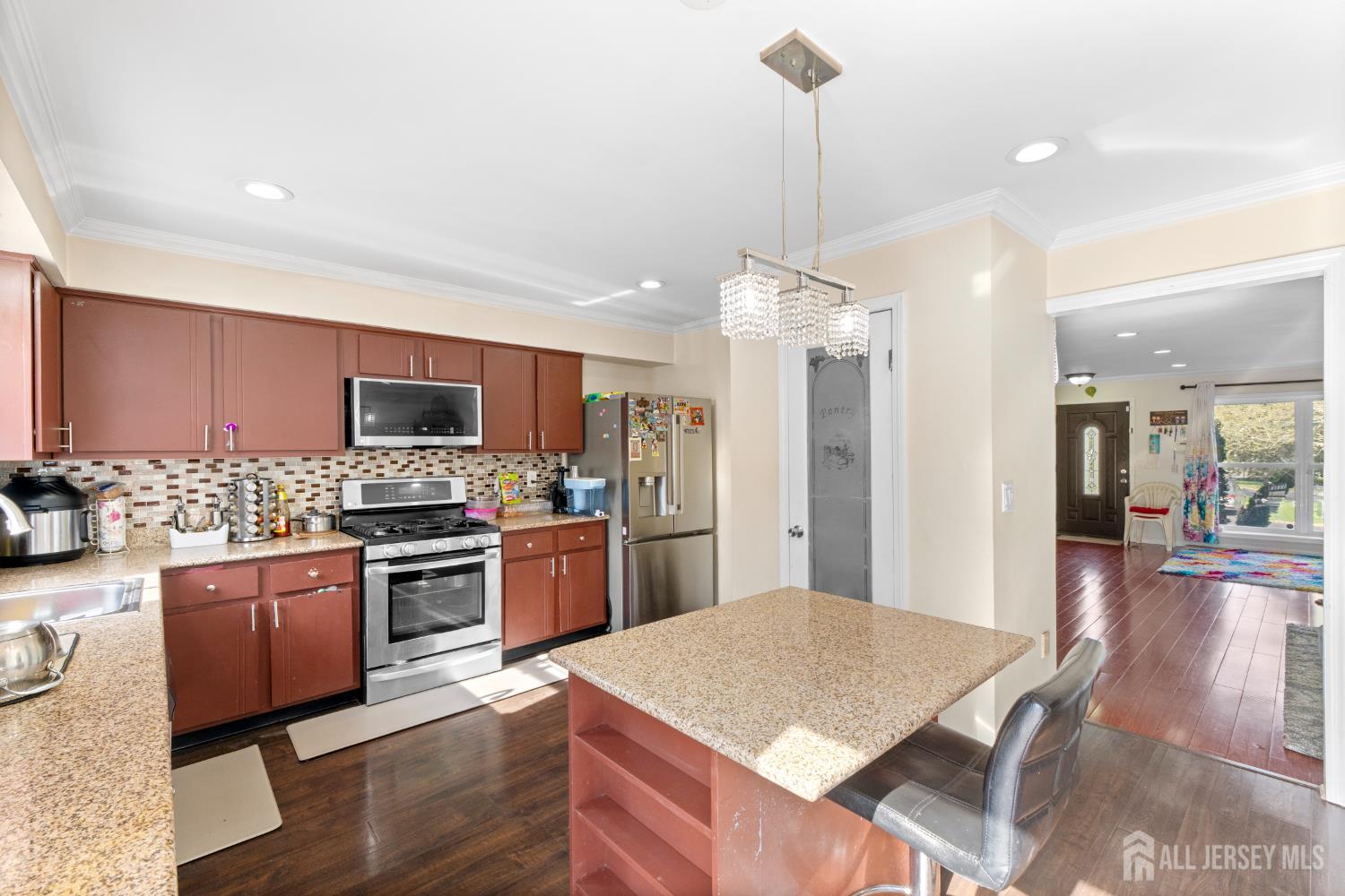 114 Pendleton Place Old Bridge, NJ 08857 - Photo 15 of 49 a open kitchen with stainless steel appliances granite countertop a stove refrigerator and a sink