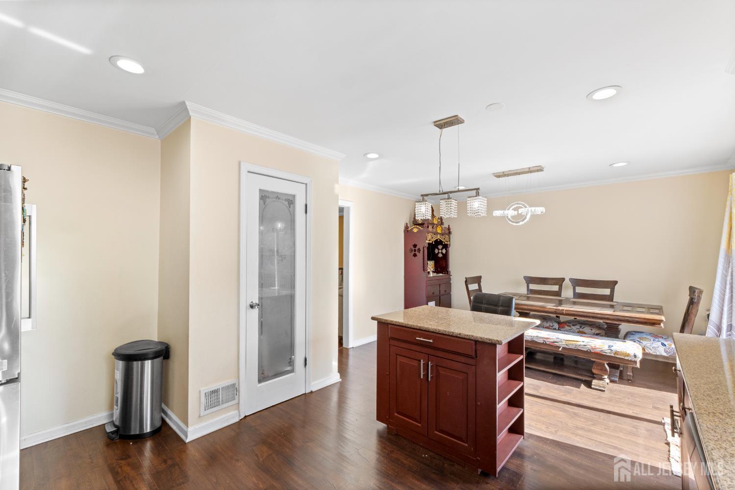 114 Pendleton Place Old Bridge, NJ 08857 - Photo 17 of 49 a room with furniture and wooden floor