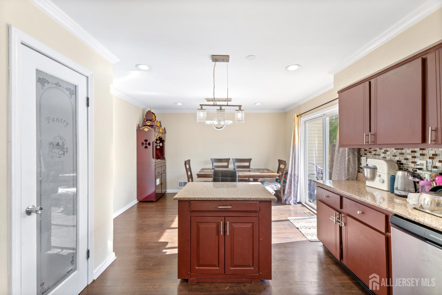 114 Pendleton Place Old Bridge, NJ 08857 - Photo 18 of 49 a kitchen with granite countertop counter space a sink appliances and cabinets
