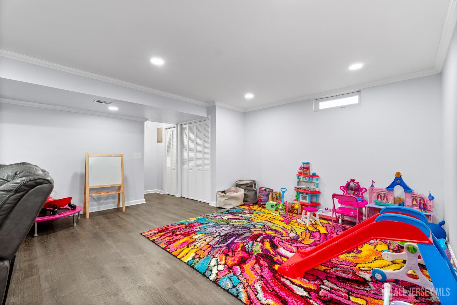 114 Pendleton Place Old Bridge, NJ 08857 - Photo 22 of 49 a bedroom with a bed and a couch