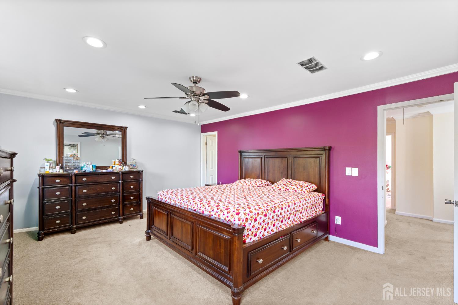 114 Pendleton Place Old Bridge, NJ 08857 - Photo 26 of 49 a bedroom with a bed and a chandelier