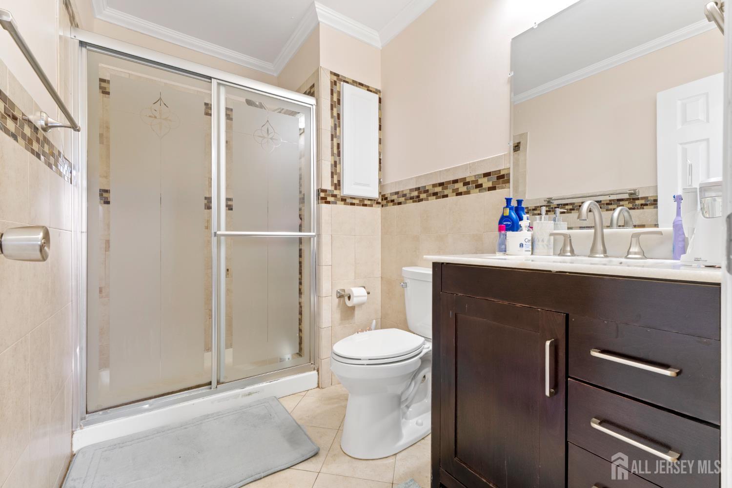 114 Pendleton Place Old Bridge, NJ 08857 - Photo 29 of 49 a bathroom with a sink toilet and shower