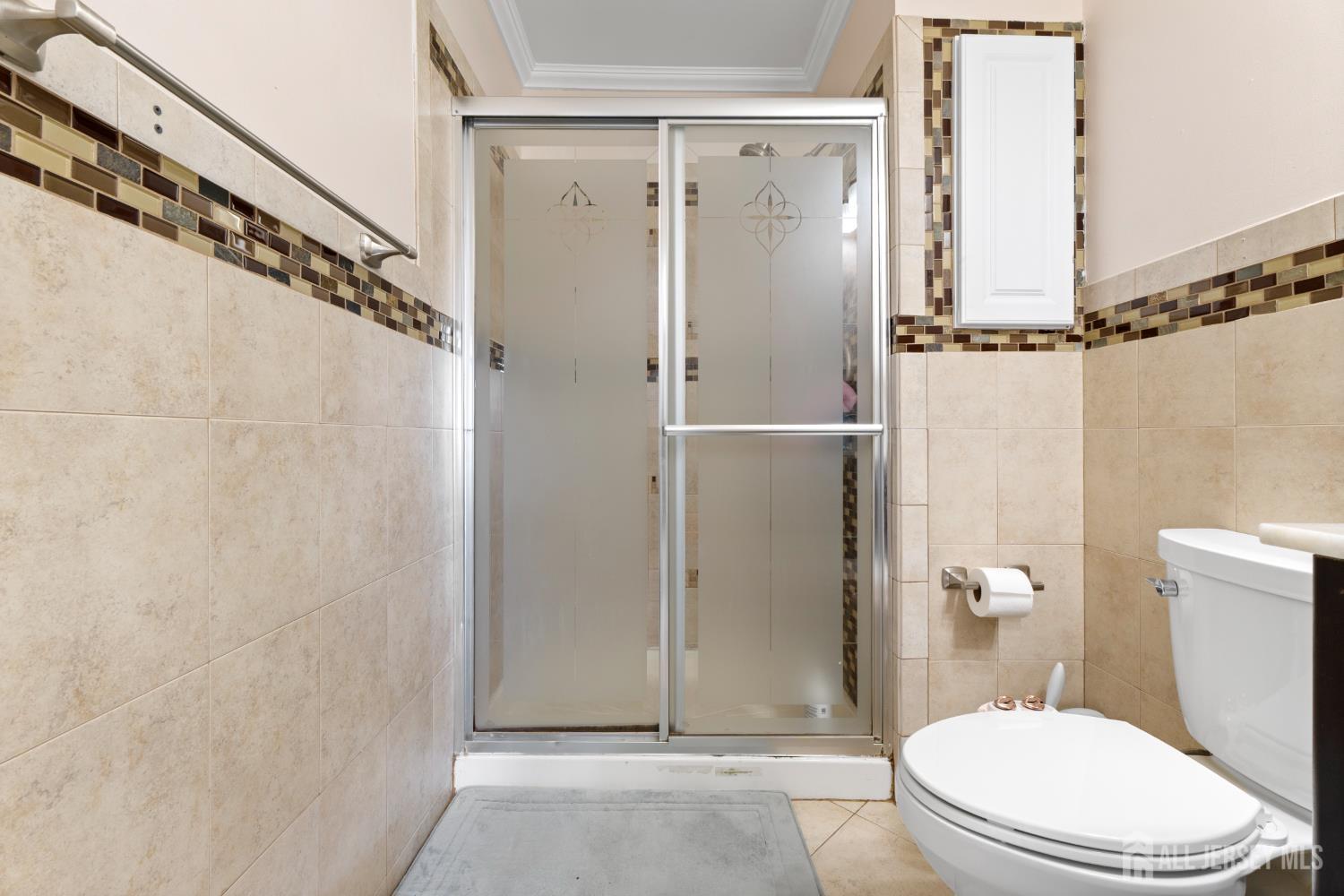 114 Pendleton Place Old Bridge, NJ 08857 - Photo 30 of 49 a white toilet sitting next to a bathroom sink